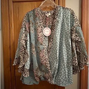 Deep V loose sleeve blouse. Sage floral and leopard pattern. Size Large.